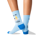A pair of light blue crew socks with bright blue heels, toes, and cuffs, featuring a graphic text of 'KNISH ME. I'M JEWISH.'