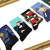Collection of socks with artistic designs inspired by famous paintings on a white background