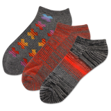 Three pairs of socks with different patterns on a white background