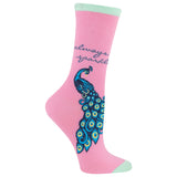 A single pink crew sock with a mint green cuff and toe, featuring a large blue peacock graphic and the words 'always sparkle' in dark blue script. thumbnail