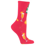 A single bright pink crew sock with a repeating pattern of champagne glasses, orange slices, and a green bottle on a white background. thumbnail
