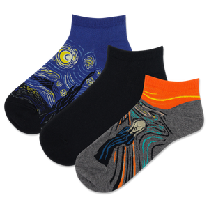 Three pairs of socks with artistic designs on a white background
