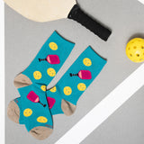 Pair of blue socks with colorful designs on a gray surface thumbnail