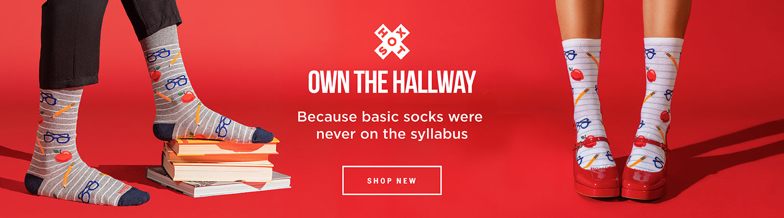 Promotional banner for patterned crew socks, showing partial lower legs of two models wearing white socks with colorful cartoon-style prints. One model stands on a stack of books, and the other wears red shoes.