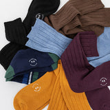 Assorted colorful socks with a K.Bell brand logo on a white background thumbnail