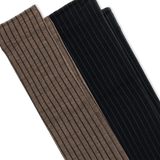 Two ribbed knit socks oshown diagonally on a white background, one in taupe-brown and one in black.