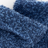 Close-up of blue textured fabric thumbnail