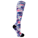 Dr. Scholl's women's compression socks featuring a black and white tie dye pattern and black accents at the heel and toe.