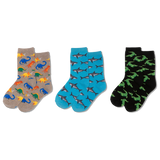 Gray socks with colorful dinosaur pattern worn by a child in denim jeans. thumbnail