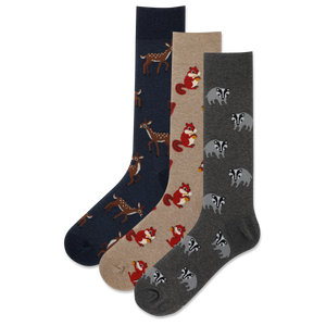 Three pairs of socks with animal patterns on a white background