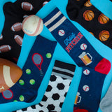 Assorted men's novelty HOTSOX socks featuring sports-themed motifs.