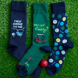 Thre pairs of HOTSOX men's golf-themed novelty socks.