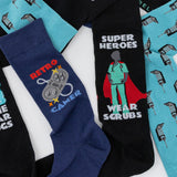 Pair of socks with 'Retro Gamer' and 'Super Heroes Wear Scrubs' designs on a white background.