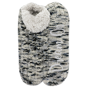 Pair of gray and black patterned slippers with white fleece lining on a white background