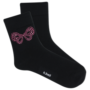 Black socks with pink bow design and 'k.bell' branding on a white background