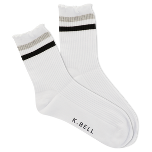 White socks with black and gray stripes and 'K. Bell' branding on a white background